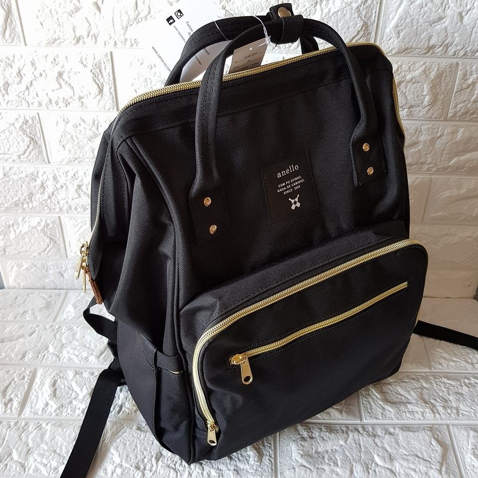 black polka dot backpack
