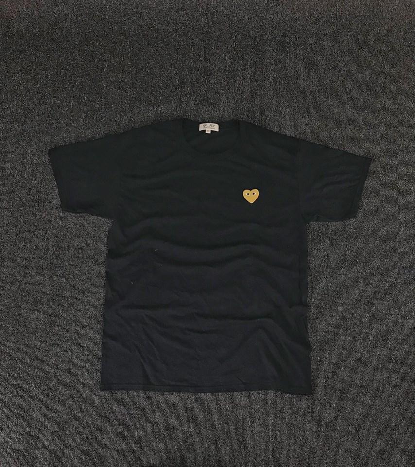 gold comme des garcons