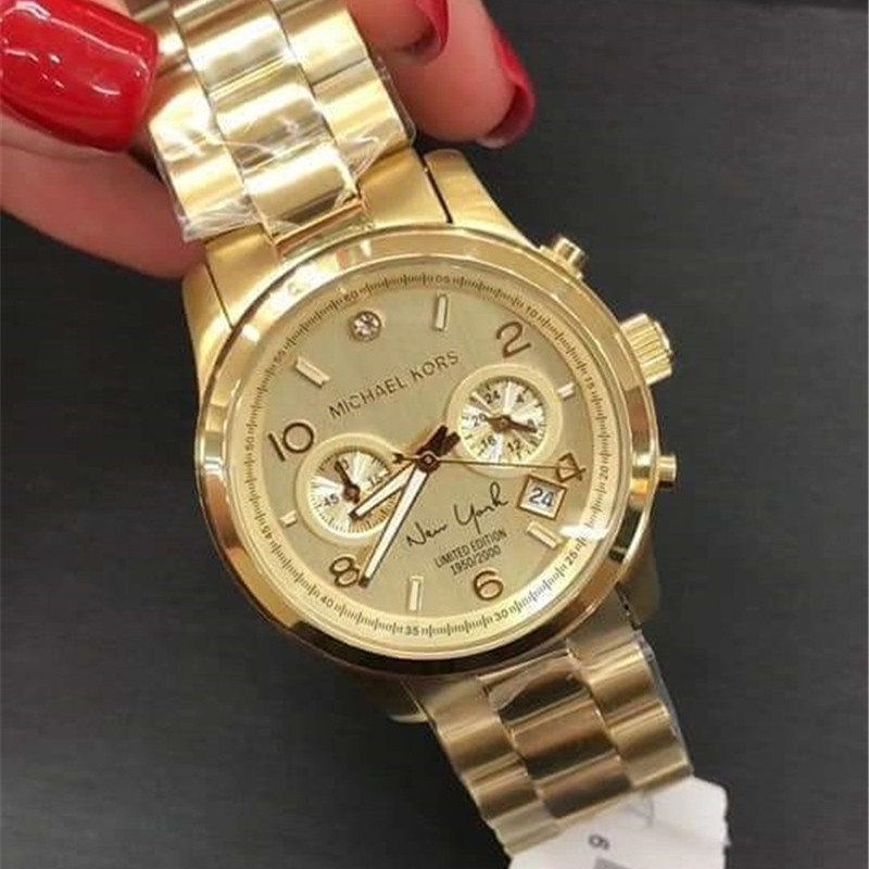 michael kors female gold watch