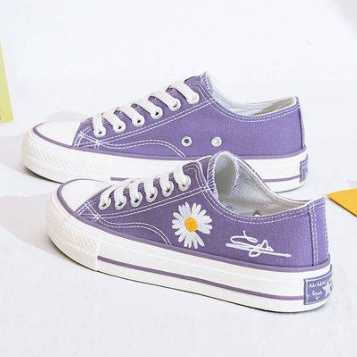 Shop Purple Converse online 