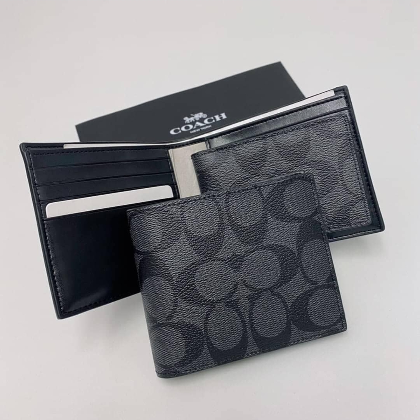 Let's compare them- Coach men Wallet F74993 