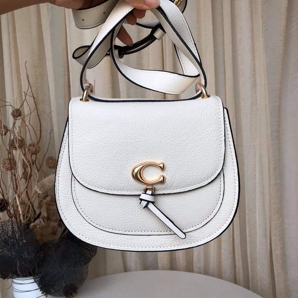 Coach remi saddle discount bag