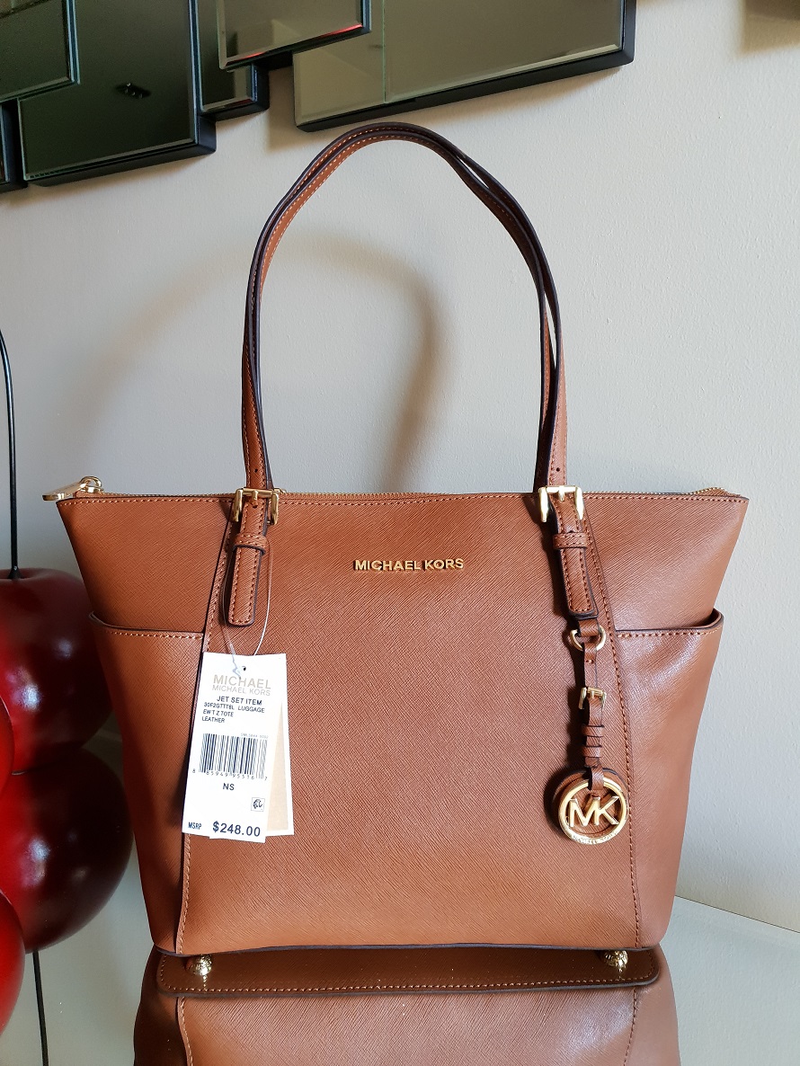 REPRICED)Michael Kors Mocha Jet Set Snap Pocket Tote, Women's Fashion, Bags  & Wallets, Cross-body Bags on Carousell