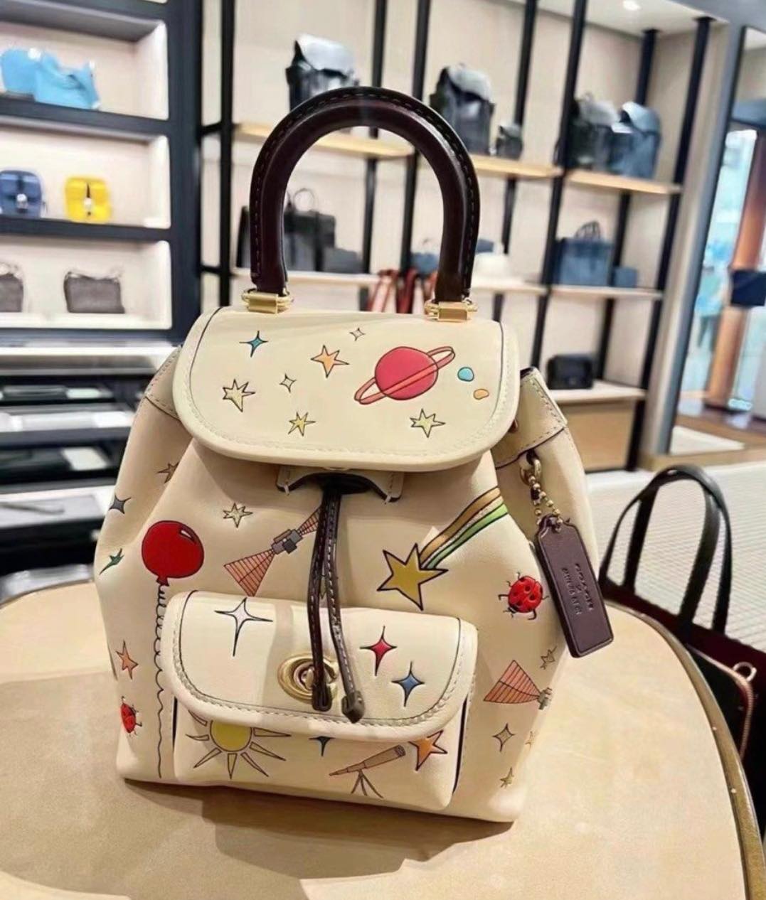 LOUIS VUITTON Calfskin Flowers Lockme Mini Backpack Creme