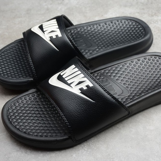 nike slippers black and white
