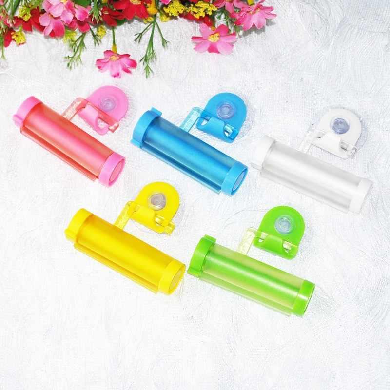 New Toothpaste Rolling Squeezer Dispenser Tube Sucker Hanging Holder DS