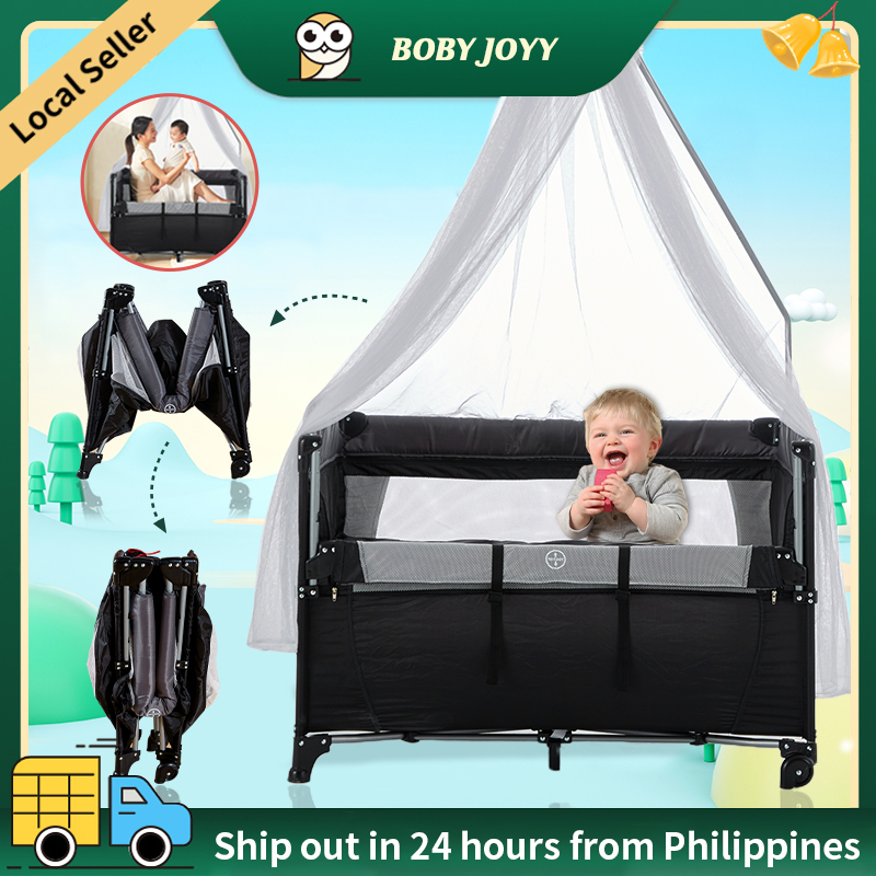 Joovy travel crib best sale