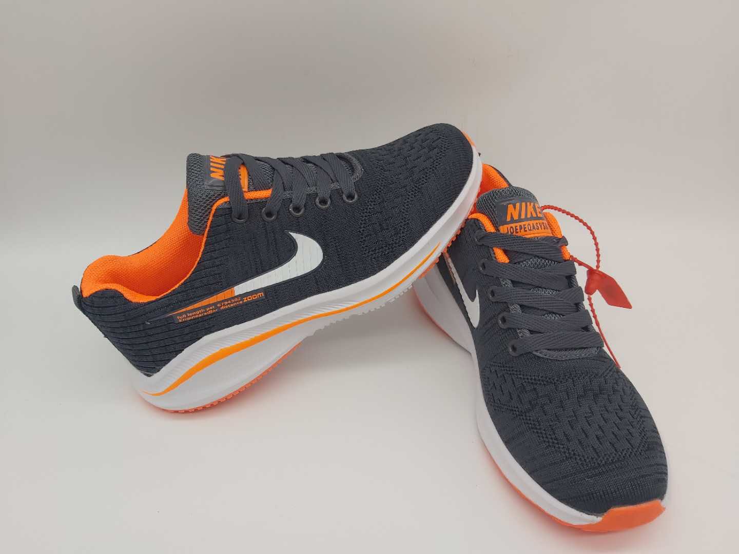 gray and pink nike shoes