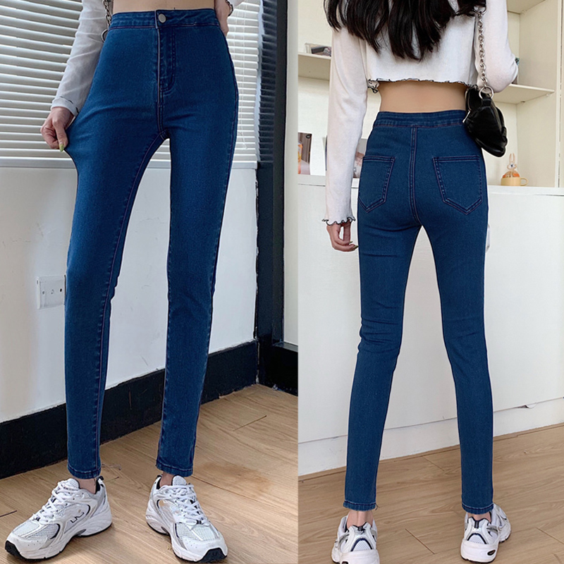 high waist pants and sneakers