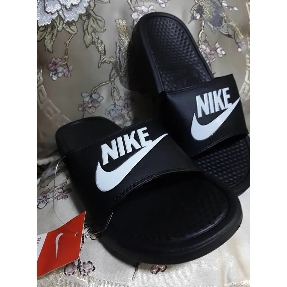 black nike slippers