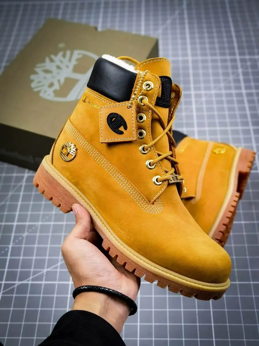 black and gold champion timberlands