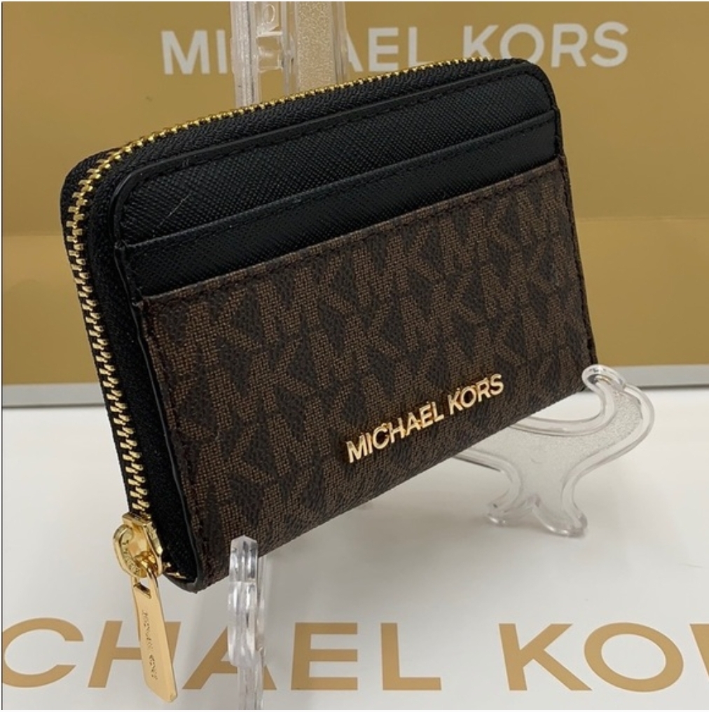 Michael Kors Cora Mini Zip Pouchette in Signature Light Cream, Luxury, Bags  & Wallets on Carousell