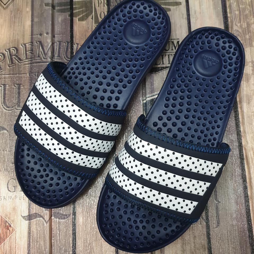 spiky adidas slides