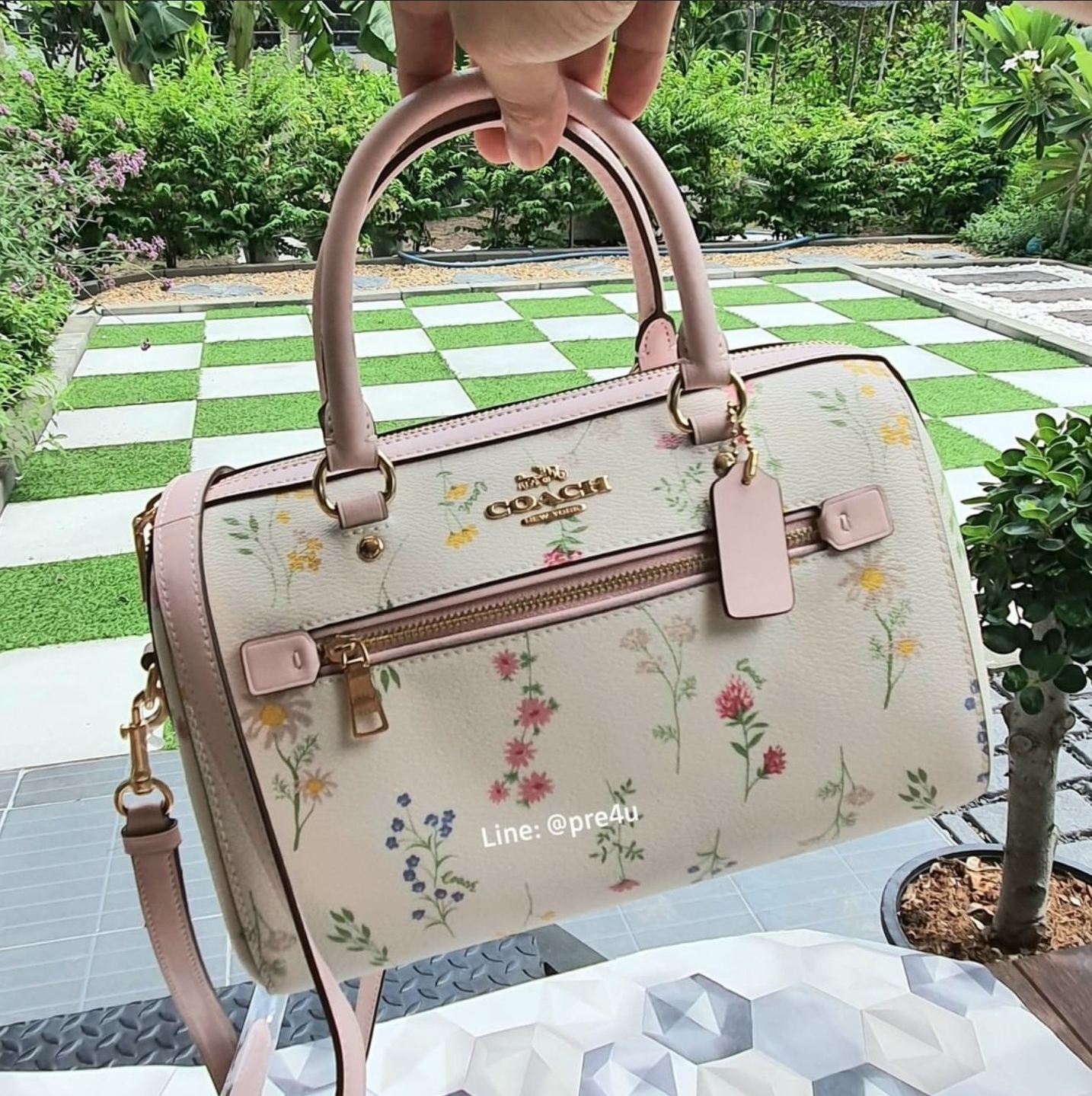 Coach rowan satchel with rose best sale bouquet print