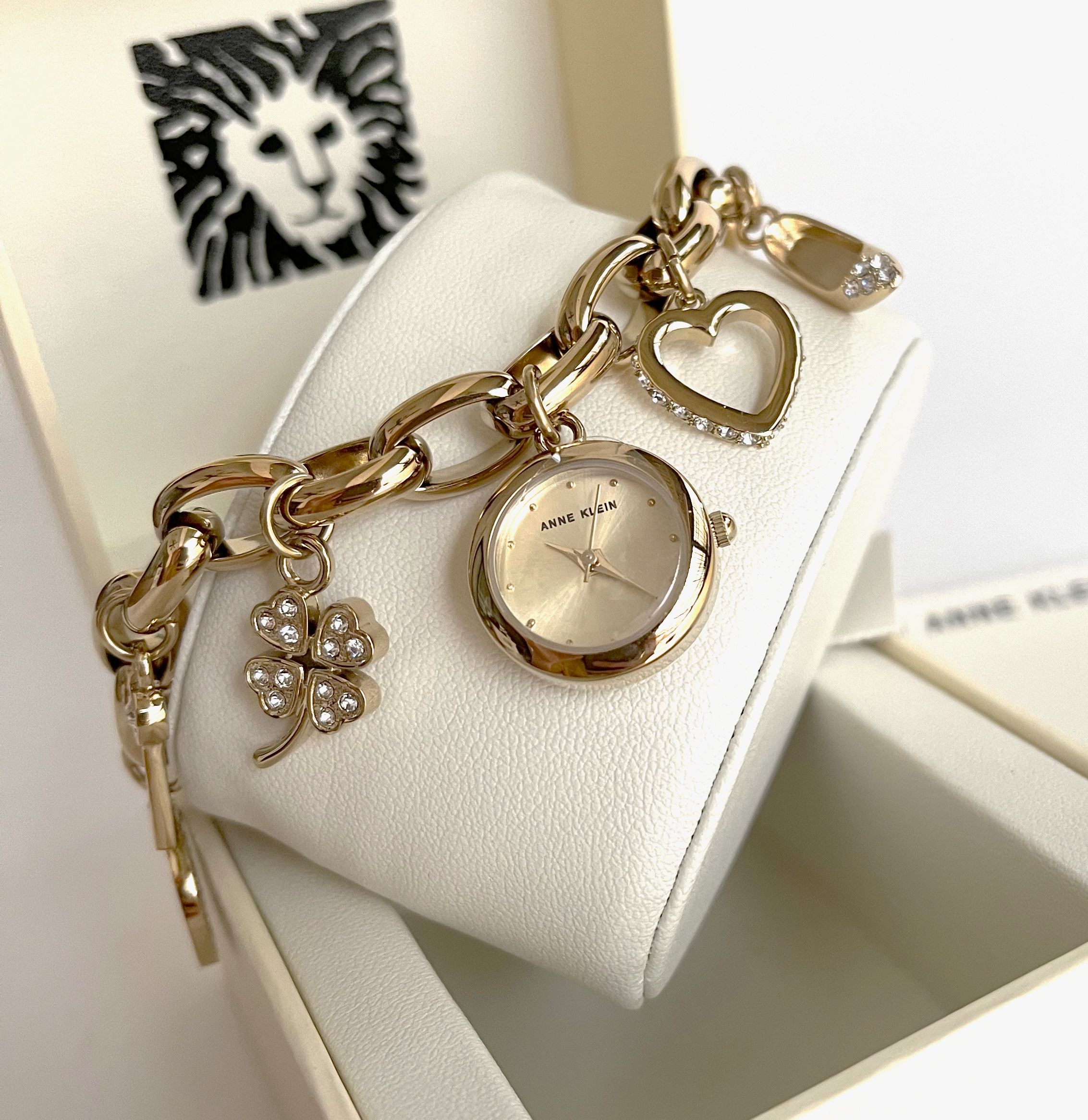 Anne Klein Women's 10-8096CHRM Swarovski Crystal Accented Gold-Tone Charm  Bracelet Watch : Anne Klein: Amazon.in: Fashion