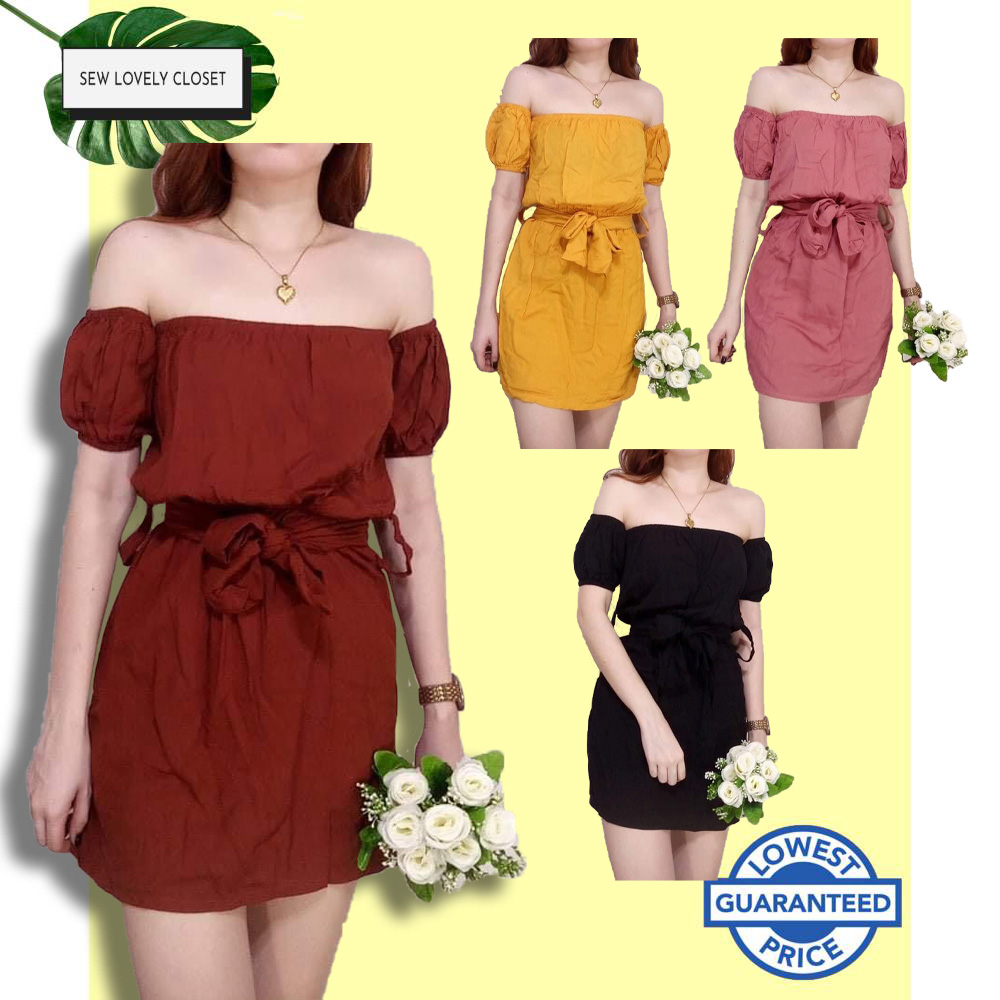 dress with belt on shoulder